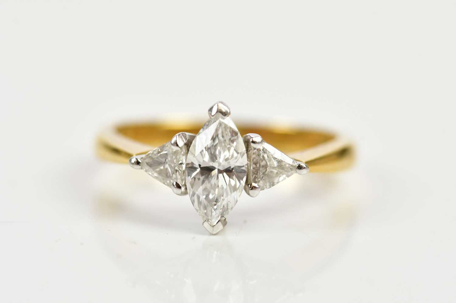Lot 29 - An 18ct yellow gold diamond marquise and...