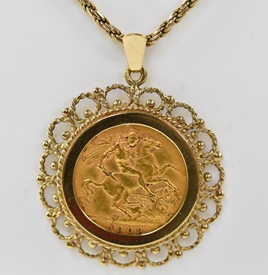 Lot 1185 - An Edward VII half sovereign 1909, in a 9ct...