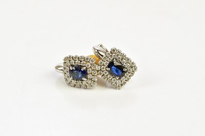 Lot 318 - A pair of 18ct white gold sapphire and diamond...