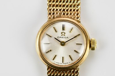 Lot 567 - OMEGA; a 1970 9ct gold lady's wristwatch with...