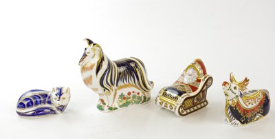 Lot 2806 - ROYAL CROWN DERBY; four paperweights including...