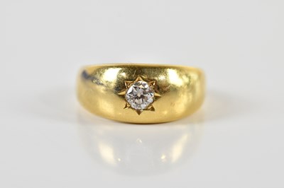 Lot 1357 - An 18ct yellow gold diamond set ring, the...