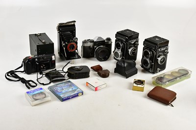 Lot 2667 - ROLLEIFLEX; two Rolleiflex T TLR camera,...