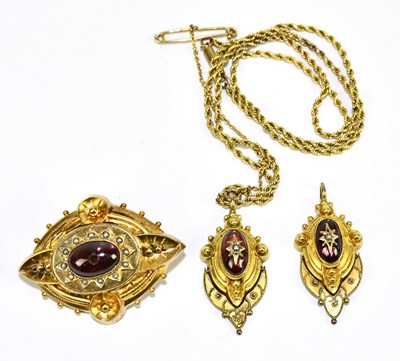 Lot 1427 - A Victorian yellow metal garnet and seed pearl...