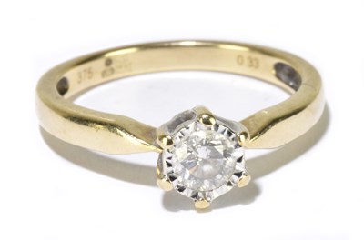 Lot 1241 - A contemporary 9ct yellow gold diamond solitaire ring