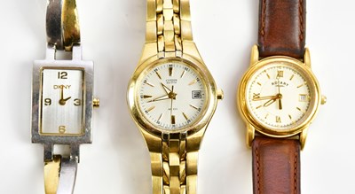 Lot 623 - Three lady's fashion watches comprising DKNY,...