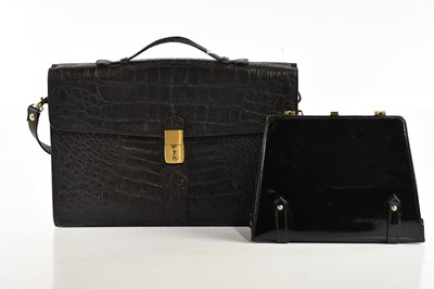 Lot 2053 - A black vintage crocodile skin briefcase with...