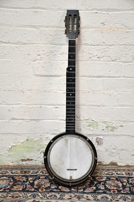 Lot 1596 - MACDONALD; a full back seven string banjo.