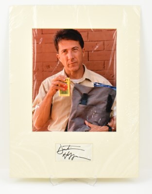 Lot 1677 - DUSTIN HOFFMAN; a mounted display featuring a...