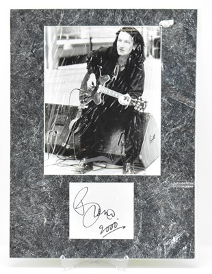 Lot 1751 - BONO; a mounted display depicting photo print...