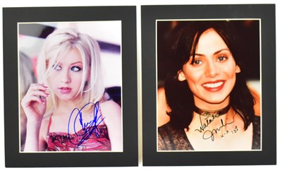 Lot 1680 - Two signed colour photographs of pop singers...