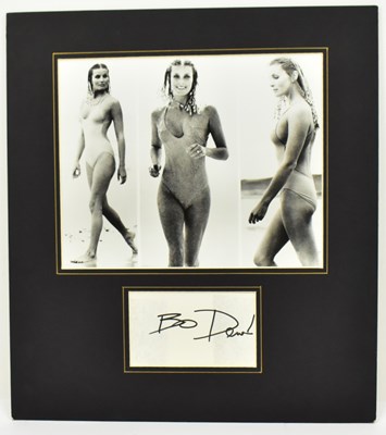 Lot 1684 - BO DEREK; a mounted display with three black...
