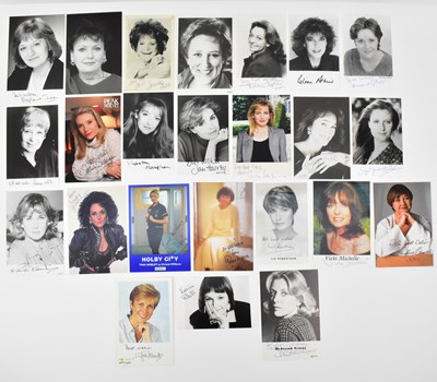 Lot 1686 - Twenty-four signed female TV personality...