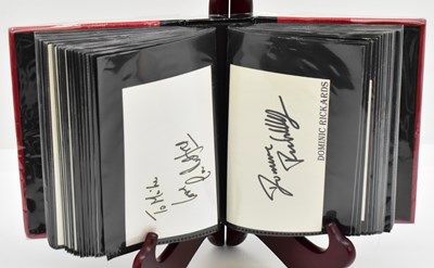 Lot 1793 - A small, full album containing signed papers...