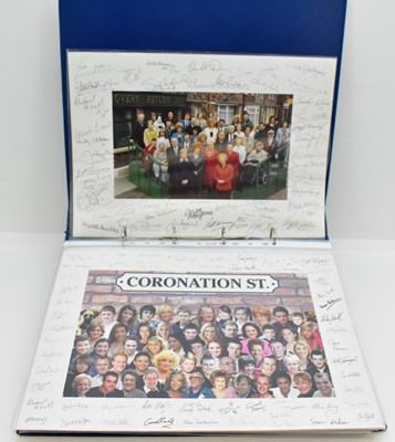 Lot 1589 - A large blue album containing autographs and...