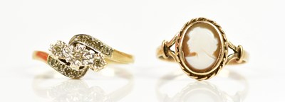 Lot 196 - A 9ct yellow gold three stone ring, size Q,...