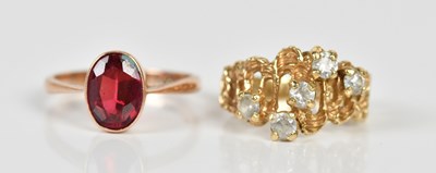 Lot 1505 - A 9ct rose gold dress ring set with a single...
