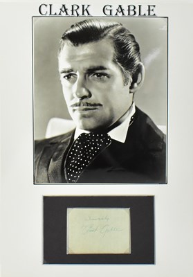 Lot 1790 - CLARK GABLE; a black and white photo image of...