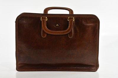Lot 2043 - THE BRIDGE; a tan leather briefcase, with top...