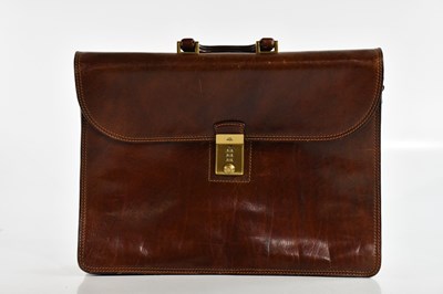 Lot 2055 - THE BRIDGE; a large tan leather briefcase,...
