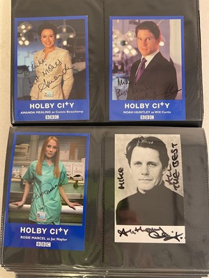 Lot 1787 - HOLBY CITY; an album containing photographed...