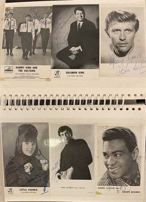 Lot 1552 - An album containing mostly black and white...