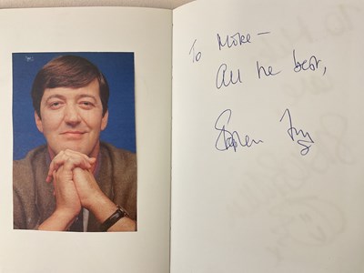 Lot 1571 - An A5 size notebook containing autographs and...
