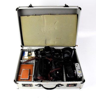 Lot 485 - A flight case containing cameras