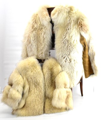 Lot 198 - Two white fur and suede short jackets (2).