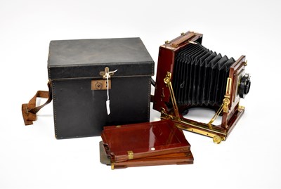 Lot 489 - A leather cased plate camera