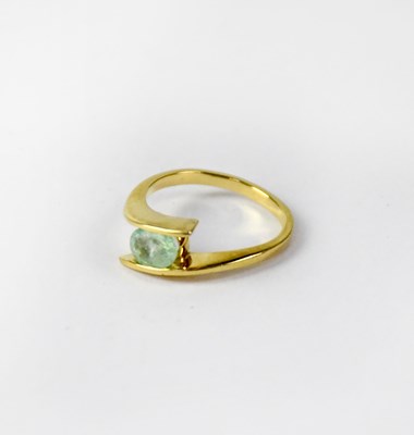 Lot 730a - An 18ct yellow gold crossover ring