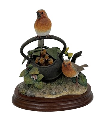Lot 605 - BORDER FINE ARTS; a figure group of two robins...