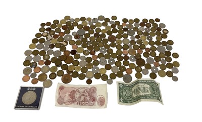 Lot 1408 - A quantity of all world coins and banknotes...