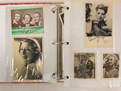 Lot 1586 - An album containing mostly black and white...