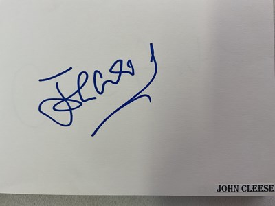 Lot 1567 - An autograph album containing signed pages for...