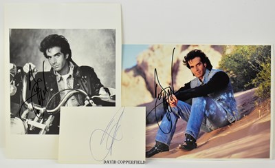 Lot 1824 - DAVID COPPERFIELD; a colour photo card signed...