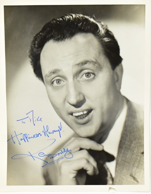 Lot 1826 - KEN DODD; an early black and white photograph...