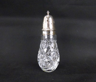 Lot 659 - An Elizabeth II cut glass crystal sugar sifter with hallmarked silver top