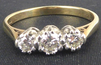 Lot 734 - A 9ct gold three-stone diamond ring