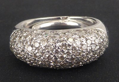 Lot 942 - A modern 18ct white gold diamond cluster ring,...