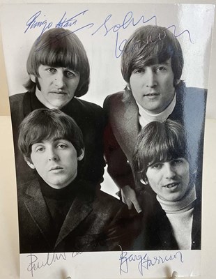 Lot 1528 - THE BEATLES; a black and white promotional...