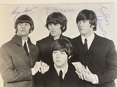 Lot 1529 - THE BEATLES; a black and white promotional...