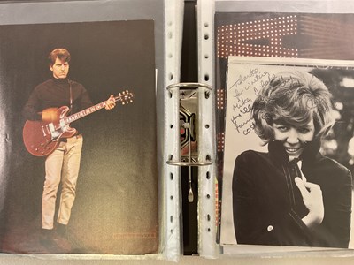 Lot 1593 - POP MUSIC; a black ring folder with fifty...