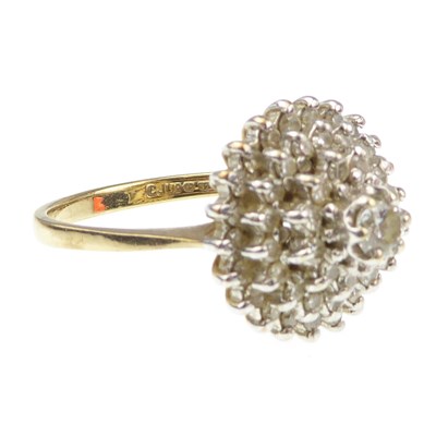 Lot 959 - A 9ct gold diamond cluster ring in the form of...