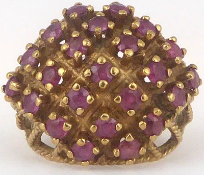 Lot 727 - A 9ct gold and ruby ring with five diagonal...