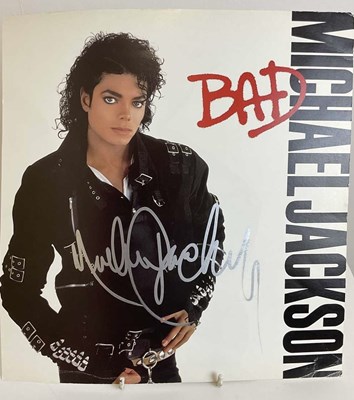 Lot 1582 - MICHAEL JACKSON; an album style front image...