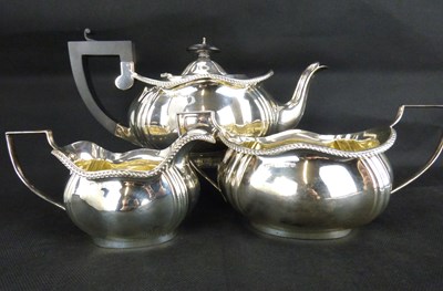 Lot 723 - A George V hallmarked silver three-piece tea set