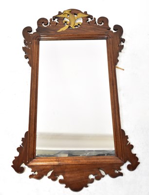 Lot 86 - A Georgian-style mahogany fret carved wall...