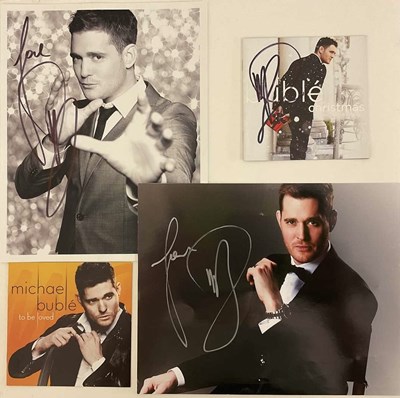 Lot 1774 - MICHAEL BUBLÉ; two signed black and white and...