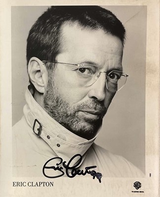Lot 1758 - ERIC CLAPTON; a black and white photo...